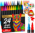 A 24-pack of acrylic markers shown with their black-and-gold retail box, plus sample painted illustrations including a colorful cat, flowers, and swatches of marker ink. The markers are arranged in rows above the box on a plain white background.