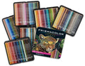 Prismacolor Premier 128-color drawing pencils arranged in multiple trays around a central tin box featuring a leopard illustration, on a white background.
