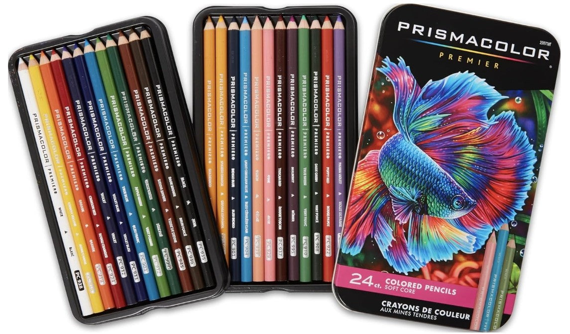 Prismacolor Premier 24 colored pencil set in a black metal tin, shown open with the pencils arranged inside and the front cover featuring a colorful betta fish illustration.